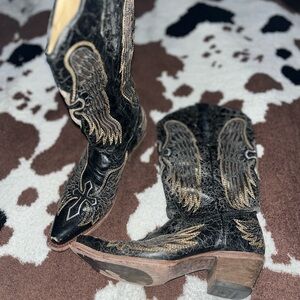 Elegant Black and Gold Winged Heeled Boots